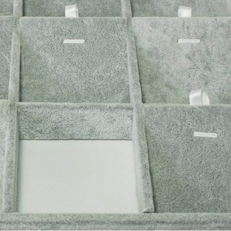 Expositor para conjuntos con tapa y cierres